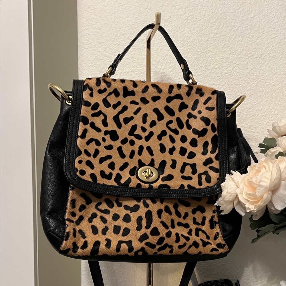 Coach Leopard  Pony-hair top handle shoulder strap with  and gold hardware.